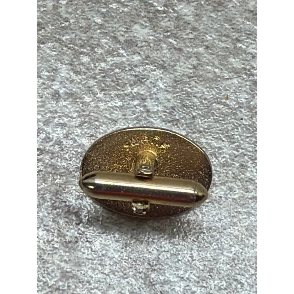 Vintage Swank Gold Tone Red Faux Ruby Textured Oval Toggle Back Cufflinks